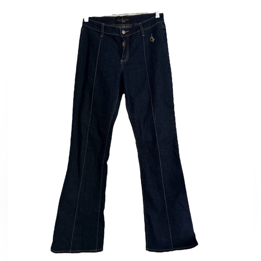 Baby Phat dark wash flared jeans with a cat logo on the front pocket. NWOT